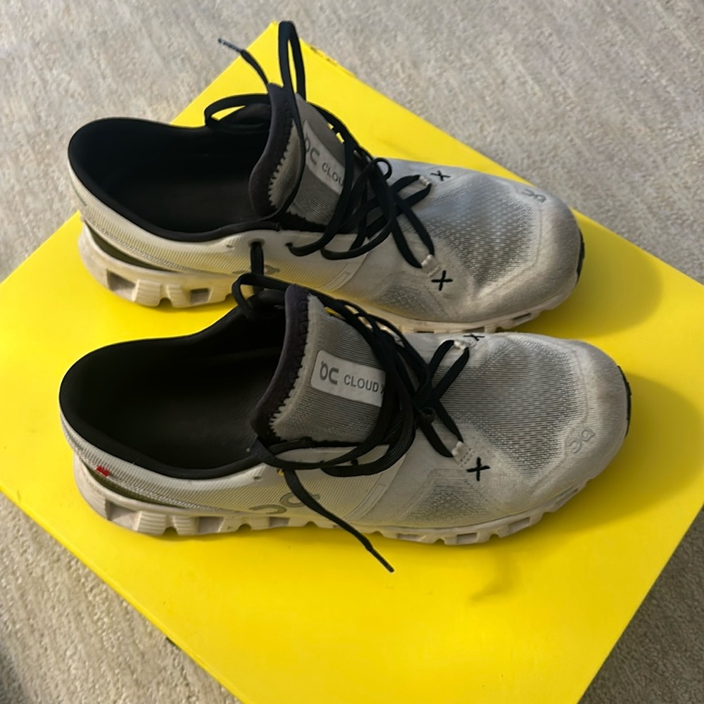 Authentic Woman’s ON Cloud X sneaker SZ 11. White w/ black laces. Very good cond